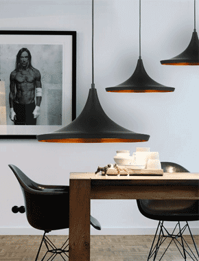Black Pendant Light with Gold Inner Over Modern Home Dining Table